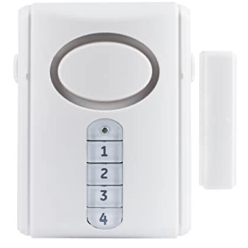GE Deluxe door alarm. New in box(package is damaged but product is in new shape